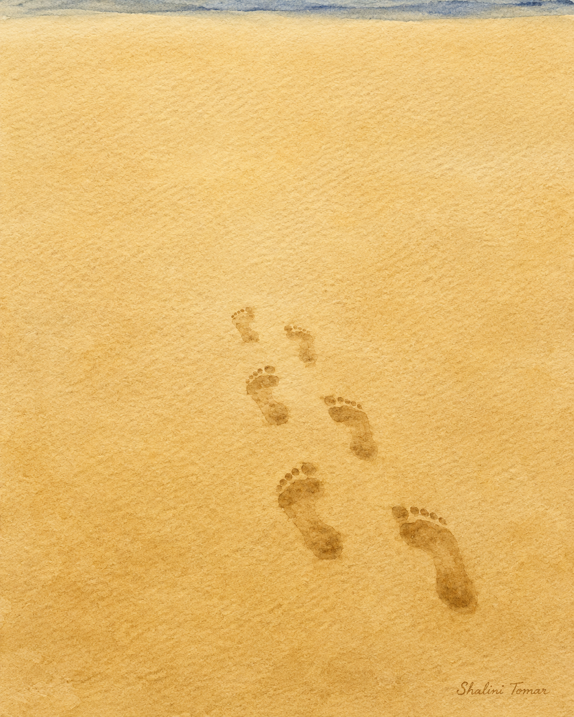 Adult and child footprints cross golden sand toward a narrow band of blue sea